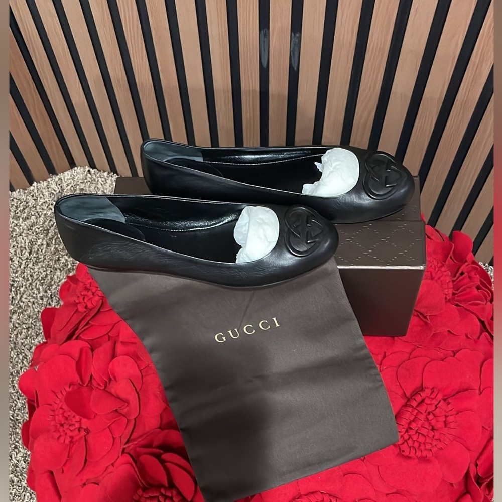 Black GUCCI womens flats with heart on toes point.